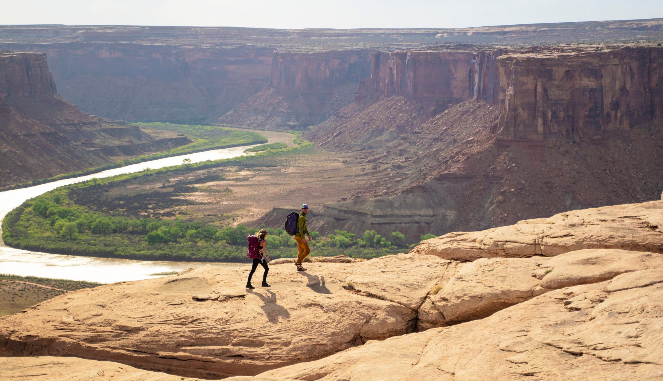 two people hiking the canyons