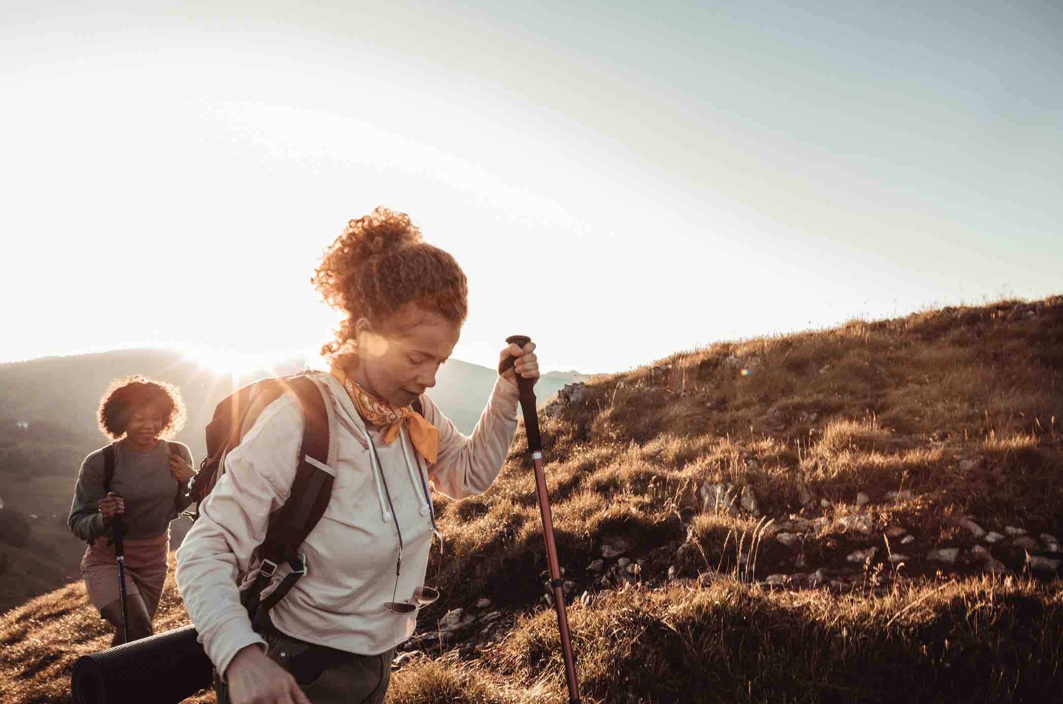 A woman hiking in a scenic location