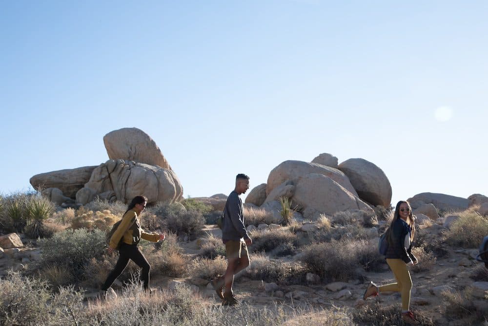 three people hiking