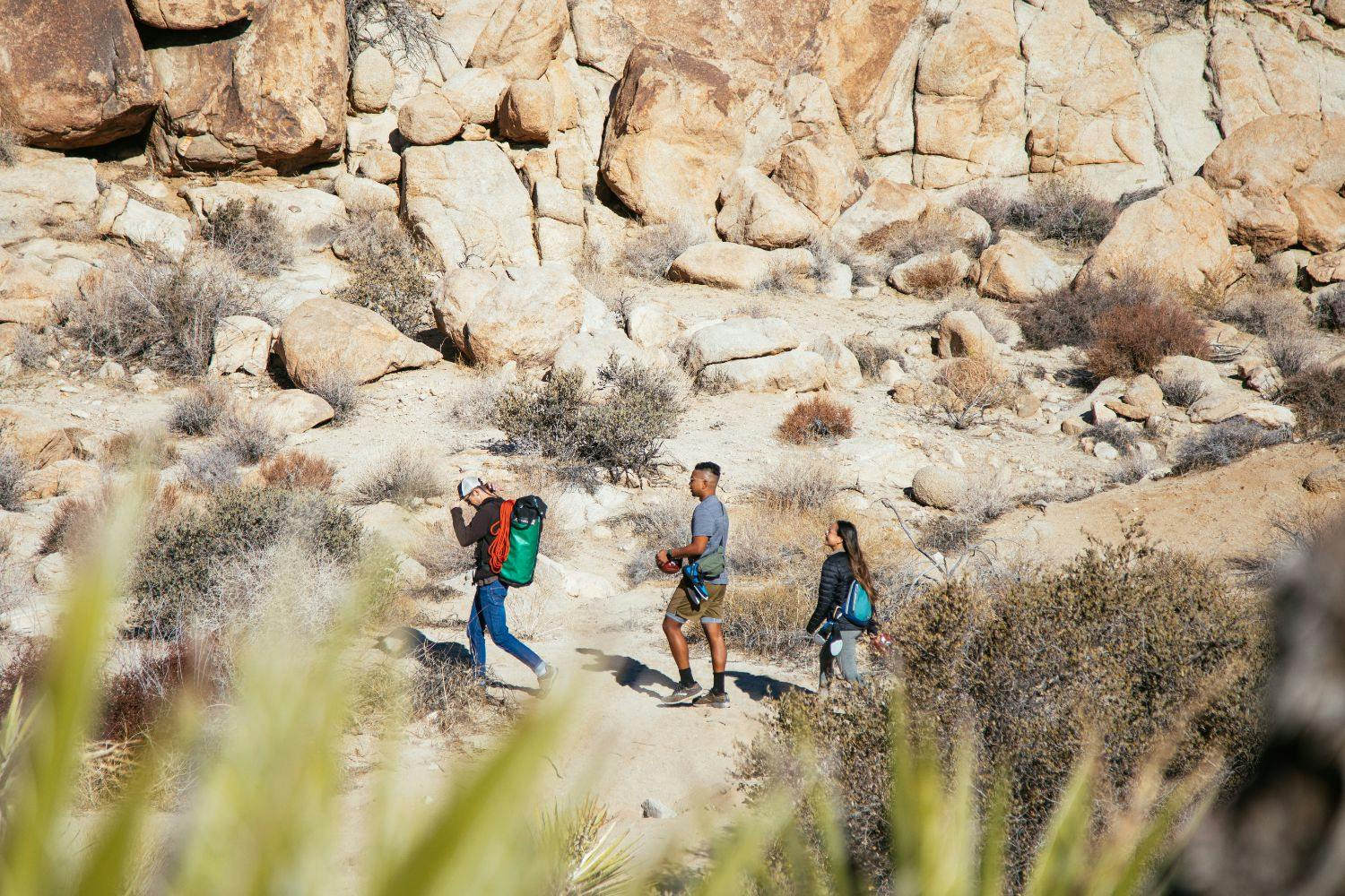three people hiking