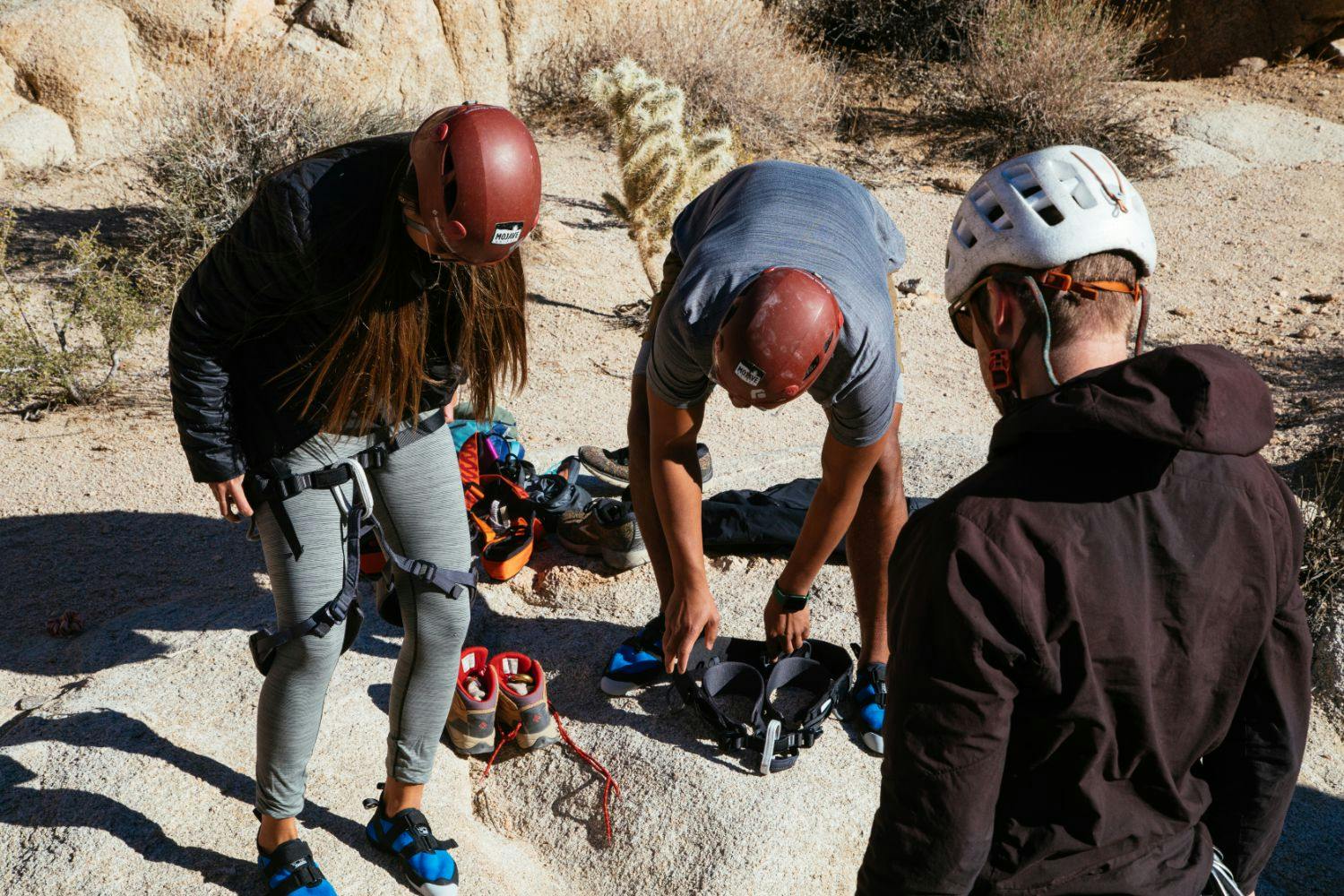 three people getting ready for an activity